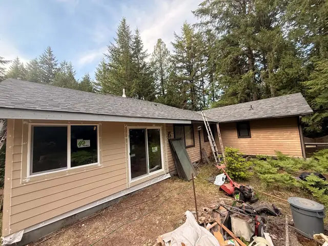 Ranch home with new siding, windows and roof
